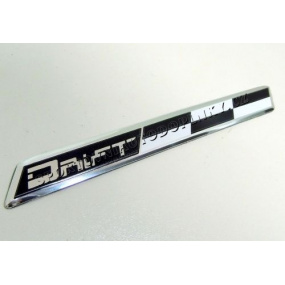Plastický znak DRIFT alu provedení s podlepením 120X15 mm